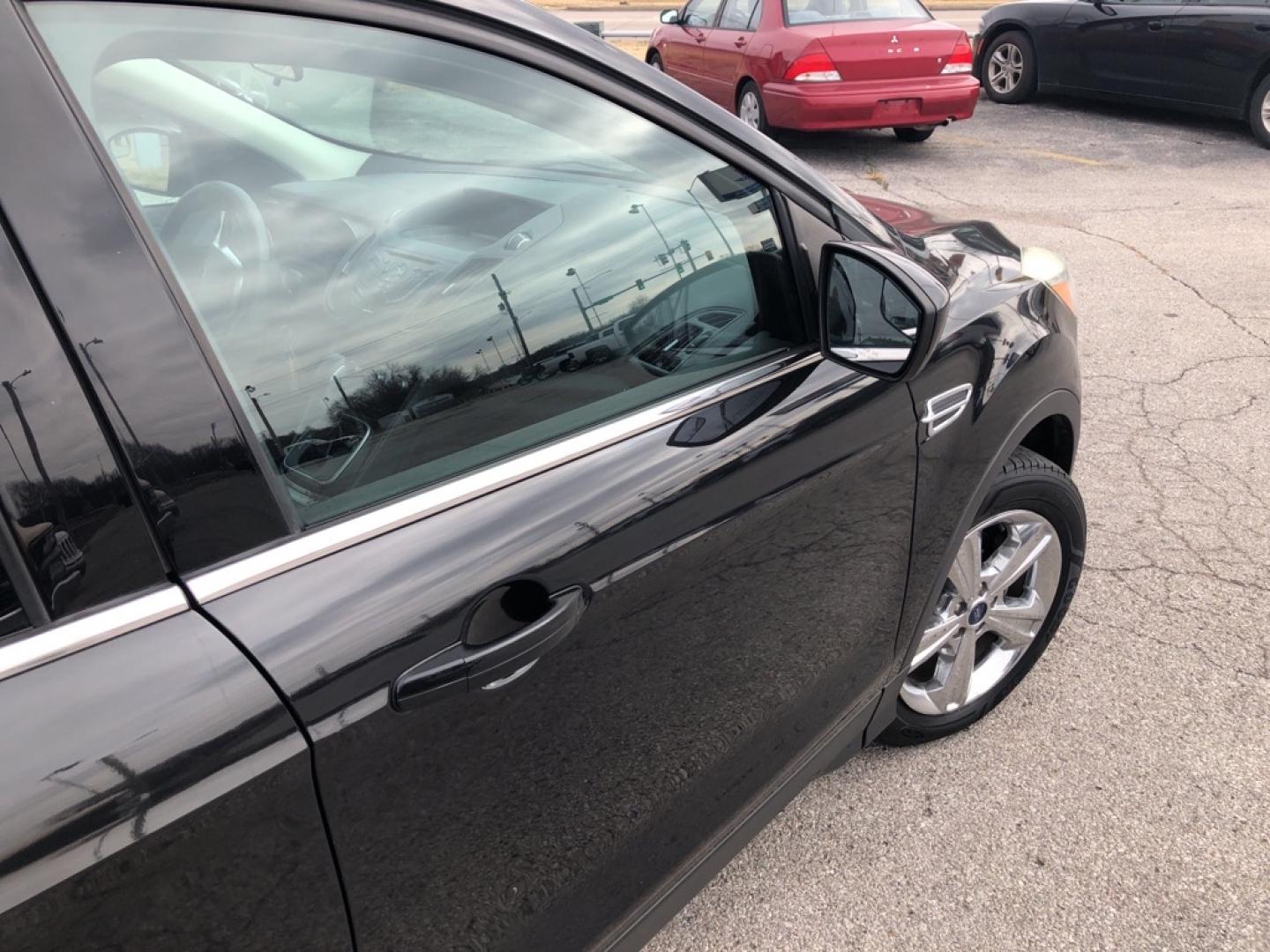 2014 BLACK FORD ESCAPE SE (1FMCU0GX0EU) with an 1.6L engine, Automatic transmission, located at 850 South Mill Street, Pryor, 74361, (918) 825-3030, 36.293549, -95.324440- Photo#21