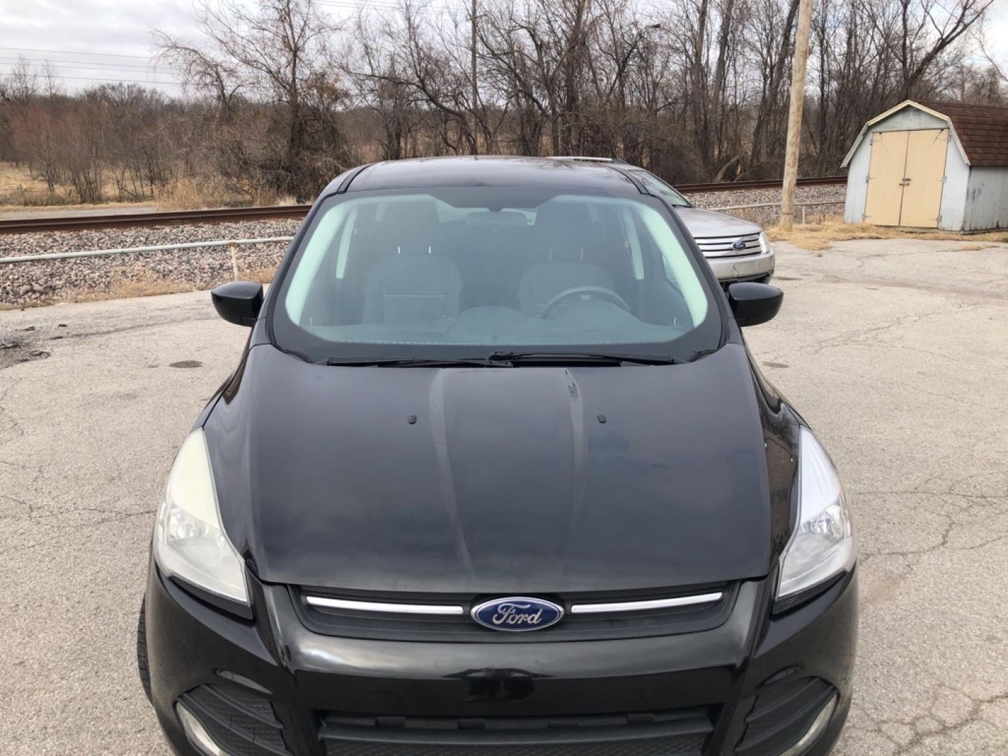 2014 BLACK FORD ESCAPE SE (1FMCU0GX0EU) with an 1.6L engine, Automatic transmission, located at 850 South Mill Street, Pryor, 74361, (918) 825-3030, 36.293549, -95.324440- Photo#28