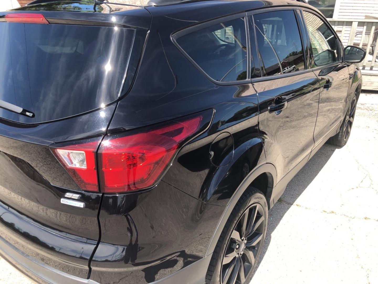 2019 BLACK FORD ESCAPE SE (1FMCU0GD7KU) with an 1.5L engine, Automatic transmission, located at 850 South Mill Street, Pryor, 74361, (918) 825-3030, 36.293549, -95.324440- Photo#25